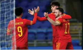  ?? Republic. Photograph: Simon Galloway/PA ?? Rubin Colwill (centre) celebrates with teammates after equalising for Wales against Czech