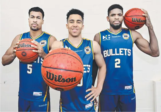  ?? Picture: ANNETTE DEW ?? US imports Stephen Holt, Travis Trice and Perrin Buford hope to leave a big mark on Brisbane’s NBL season.