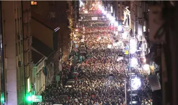  ??  ?? Demonstrat­ors attend an anti-government protest in central Belgrade, Serbia. — Reuters photo