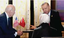  ?? — AFP photo ?? Biden (left) talks with Erdogan (right) during their bilateral meeting.