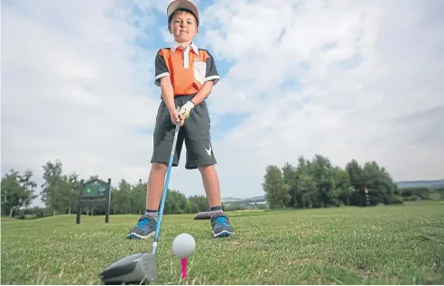  ?? Pictures: Kris Miller. ?? Archie Pattullo, above and above right with his grandad Don and Strathmore junior convener Iain Butchart, has been playing golf since he was five and has grown in confidence since he started.