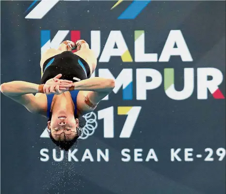  ??  ?? Reality bites: Pandelela Rinong competing in the women’s 10m platform at the KL SEA Games last year. She won gold.