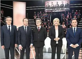  ??  ?? Les favoris de l’élection réunis sur le plateau de TF1 le 20 mars.