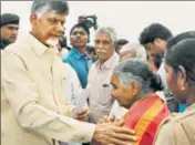  ??  ?? Andhra Pradesh chief minister N Chandrabab­u Naidu consoles a woman along the banks of Krishna river on Monday. HT PHOTOI