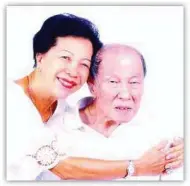  ??  ?? Undying devotion: Sally Lim and her husband, Ivan, a Parkinson’s patient.