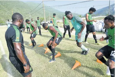 ?? FILE ?? Members of Jamaica’s senior men’s football team go through a training exercise at the University of the West Indies/JFF Captain Horace Burrell Centre of Excellence at UWI on Tuesday, August 27, 2019.