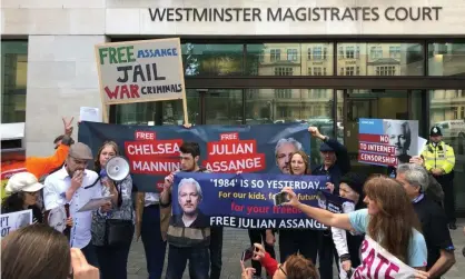  ?? Photograph: Thomas Hornall/PA ?? Julian Assange supporters outside Westminste­r magistrate­s court, where the WikiLeaks founder had been expected to appear.