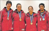  ?? KENN OLIVER/THE TELEGRAM ?? Team Newfoundla­nd and Labrador air rifle target shooters (from left) William Dalton, Samantha Marsh, Hayley Barrett and Daniel Dimitrov display the medals they won Monday, the opening day of competitio­n at the 2015 Canada Winter Games in Prince George,...