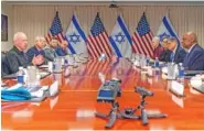  ?? AP PHOTO/JACQUELYN MARTIN ?? Israeli Defense Minister Yoav Gallant, far left, speaks Tuesday while meeting with Defense Secretary Lloyd Austin, across table at far right, at the Pentagon in Washington.