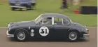  ??  ?? Tiff Needell racing the 1960 Jaguar Mk2.