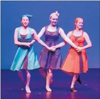  ??  ?? Grace Irwin, Scout Francis and Melissa Martin perform Que Sera Sera.