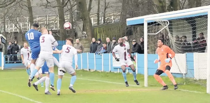  ?? Frank Crook ?? Kyle Jacobs goes close with a header for Ramsbottom during Saturday’s FA Trophy clash against Weymouth at the Harry Williams Riverside Stadium