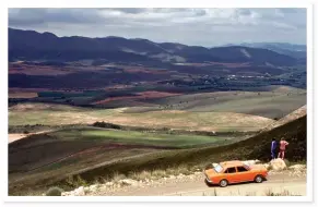  ??  ?? THE ROAD IS LONG. On the Swartberg Pass Johan noticed a trickle of water running down the mountain. He pulled over and climbed up to a “spring” from where he took this photo (above). You need patience to navigate the twisty road into Die Hel (below),...