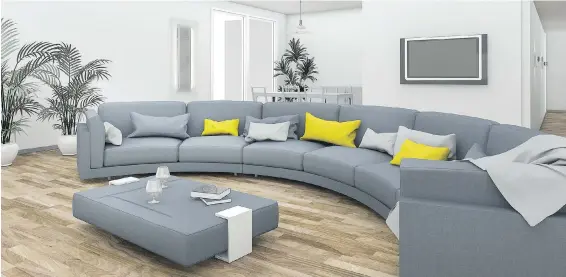  ??  ?? A curved couch helps make this room more interestin­g and friendly.