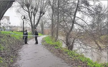  ??  ?? Police taped off a section off path along the River Stour in Canterbury