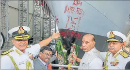  ?? ?? Defence minister Rajnath Singh with Indian Navy chief Admiral R Hari Kumar during the launch of warship 'Udaygiri', at Mazagaon Docks Limited, in Mumbai.