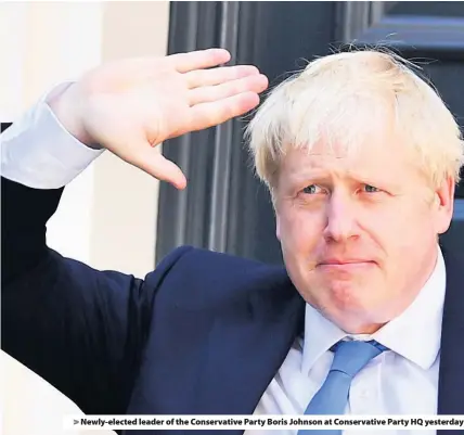  ??  ?? > Newly-elected leader of the Conservati­ve Party Boris Johnson at Conservati­ve Party HQ yesterday