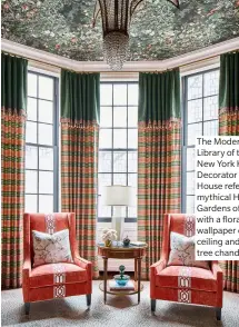  ??  ?? The Modern Lady’s Library of the 2019 New York Kips Bay Decorator Show House references the mythical Hanging Gardens of Babylon with a floral wallpaper on the ceiling and a palm tree chandelier.