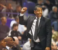  ?? Jessica Hill / Associated Press ?? The arbitrator in the dispute between UConn and former coach Kevin Ollie has ruled he is protected by a union contract when it comes to the standard the school must meet in proving his firing was justified.