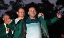  ?? Photograph: David Cannon/Getty ?? Danny Willett, the 2016 champion, presents Sergio García with his Green Jacket.