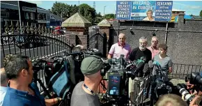  ?? AP ?? Former Sinn Fein president Gerry Adams, centre right, stands with Sinn Fein members Bobby Storey, background left, Gerry Kelly, background and Caral Ni Chuilin during a press conference at Connolly House in Belfast.