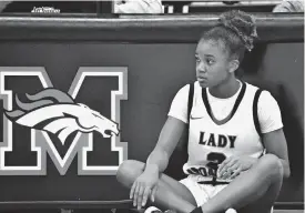  ?? [JAMES D. JACKSON/ THE OKLAHOMAN] ?? Mustang guard Randi Harding waits to enter the game against Southmoore on Tuesday.