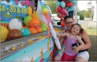  ?? LAUREN HALLIGAN - MEDIANEWS GROUP ?? Three-year-old Sophia O’Dell and Tia Downing enjoy a rubber duck game at the 2019 Saratoga County Fair.