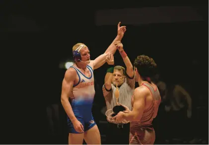  ?? U.S. COAST GUARD ACADEMY ?? Coy Spooner emerged after a year of fighting off cancer to resume winning on the wrestling mat for Coast Guard Academy.