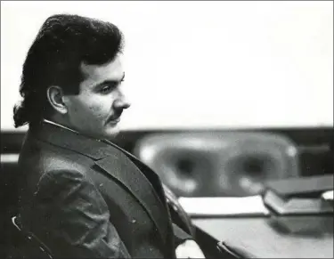  ?? NEWS-HERALD FILE ?? Donato Lombardozz­i awaits his pretrial hearing in the courtroom of Lake County Common Pleas Judge Donald C. Nugent in February 1989.