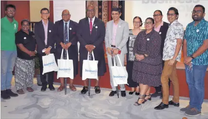  ?? Picture: ATU RASEA ?? Minister for Trade Manoa Kamikamica, fourth from left, with permanent secretary for Ministry of Trade, Cooperativ­es, Small and Medium Enterprise­s Shaheen Ali, fifth from left, with guests at the launch of the Business Now Fiji website.