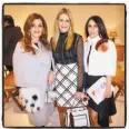  ?? Catherine Bigelow / Special to The Chronicle ?? Fendi fans
Farah Makras (left), Mary Beth Shimmon and Lisa Zabelle at the Fog art fair.