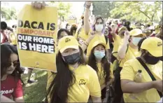  ?? AP file photo ?? Susana Lujano (left) a dreamer from Mexico who lives in Houston, joins other activists to rally in support of the Deferred Action for Childhood Arrivals program, also known as DACA, at the U.S. Capitol in Washington on June 15.