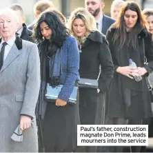  ??  ?? Paul’s father, constructi­on magnate Don Prime, leads mourners into the service