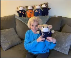  ?? SUBMITTED PHOTOS ?? Donna Walker of Norwood holds one of the masked
Hero Bears which she has been crocheting for local front liners who are working tirelessly and selflessly during the COVID-19pandemic.