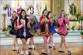  ?? JACOB VITALI — LOWELL SUN ?? Students from Heavey Quinn Academy of Irish Dance perform a traditiona­l Irish stepdance at St. Patrick Church in the Acre during last year’s Irish Cultural Week.