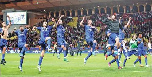  ?? JEAN-PAUL PELISSIER / REUTERS ?? Juventus players celebrate blanking Monaco 2-0 in Wednesday’s UEFA Champions League semifinal first-leg match at Stade Louis II in Monaco.