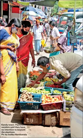  ??  ?? Kandy town: Pavement vendors said they have no intention to boycott the elections
Pic by Indika Handuwala