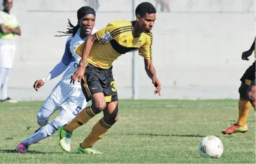  ?? BACKPAGEPI­X ?? SOLID AT BACK: Defender Junaid Sait, in yellow shirt, has returned to Milano after a spell in Sweden. He is one of several acquisitio­ns at the NFD club.