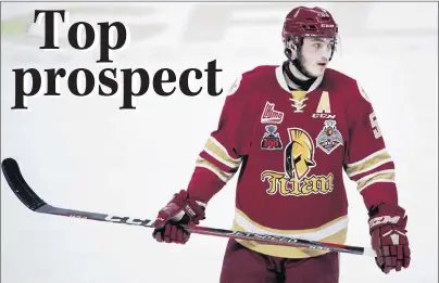  ?? CP PHOTO ?? Acadie-Bathurst Titan’s Noah Dobson is seen during first period against the Regina Pats at the Memorial Cup in Regina on Sunday, May 20. When Dobson was 15-years-old, he made the decision to forgo playing midget hockey in Canada and instead travelled...