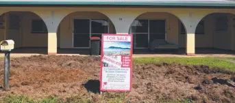  ??  ?? HOG BOG: A Mission Beach home’s front yard has been ruined by wild pigs.