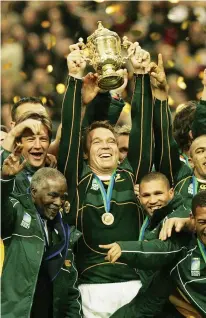  ??  ?? World beaters: John Smit lifts the 2007 World Cup