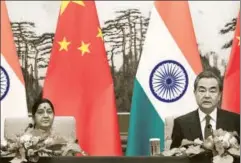  ?? REUTERS ?? Indian and Chinese foreign ministers Sushma Swaraj (left) and Wang Yi. Is it not time to recognise that India’s China policy is far too important to be left to career diplomats?
