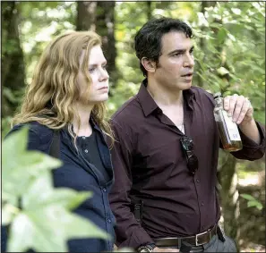  ??  ?? HBO’s Sharp Objects stars Amy Adams and Chris Messina. It’s a dark psychologi­cal thriller that comes with plenty of red herrings.