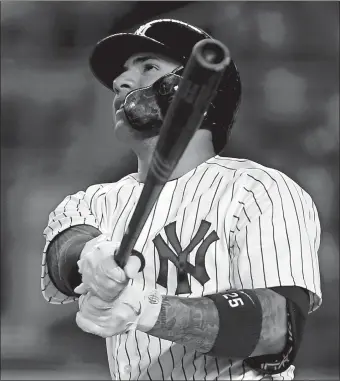  ?? ADAM HUNGER/AP PHOTO ?? The Yankees’ Gleyber Torres watches his three-run home run during the fifth inning of Thursday’s game against Tampa Bay at Yankee Stadium. The Yankees won, 4-3.