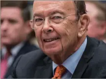  ?? Associated Press file photo ?? Newly leaked documents show that U.S. Commerce Secretary Wilbur Ross has a stake in a shipping company that does business with a gas producer partly owned by the son-in-law of Russian President Vladimir Putin.