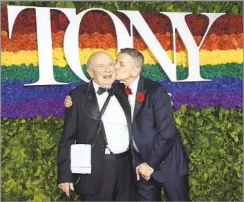  ?? Evan Agostini Invision ?? MATURING ARTISTRY Terrence McNally, left, with his husband, producer Tom Kirdahy, in 2019. McNally’s best work as a playwright came later in life with “Love! Valour! Compassion!” and “Master Class,” both of which won Tonys.