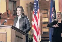  ?? MICHIGAN OFFICE OFTHE GOVERNOR/AP ?? Michigan Gov. Gretchen Whitmer addresses the state during a speech Thursday in Lansing, Michigan.