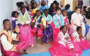  ??  ?? Children clad in Korean costumes at the celebratio­n of the Seollal Lunar New Year