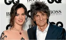  ?? PHOTO: GETTY ?? Ronnie Wood and his ‘‘girl bride’’, Sally Humphreys, at last year’s GQ Men of the Year Awards.
