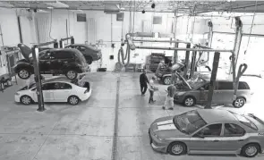  ??  ?? Students can get help with their own vehicles in the class, and IMPACT60 helps them meet other emergent personal needs as they come up, whether it’s finding them immediate employment, clothes for interviews, gas money or housing help.